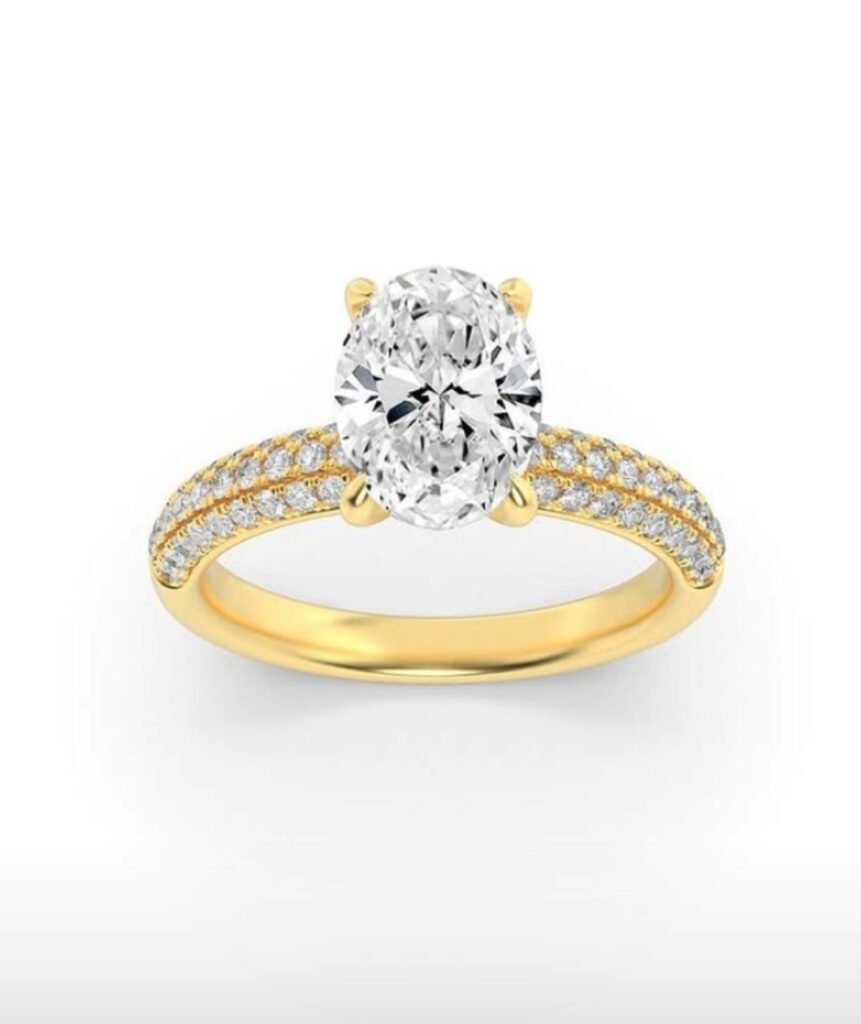 18KT YELLOW WOMENS RING WITH LAB GROWN OVAL SHAPED DIAMOND